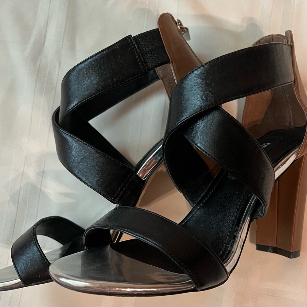 Leather high heeled sandal-zipper back. Purchased from White House Black Market.